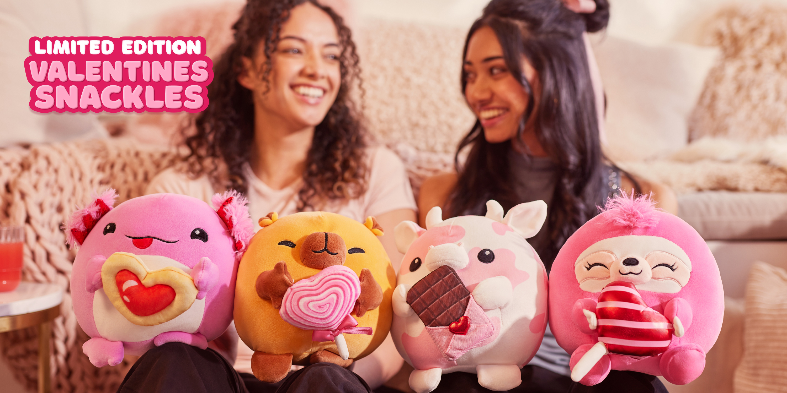 Collectors holding their ZURU Snackles plush toys